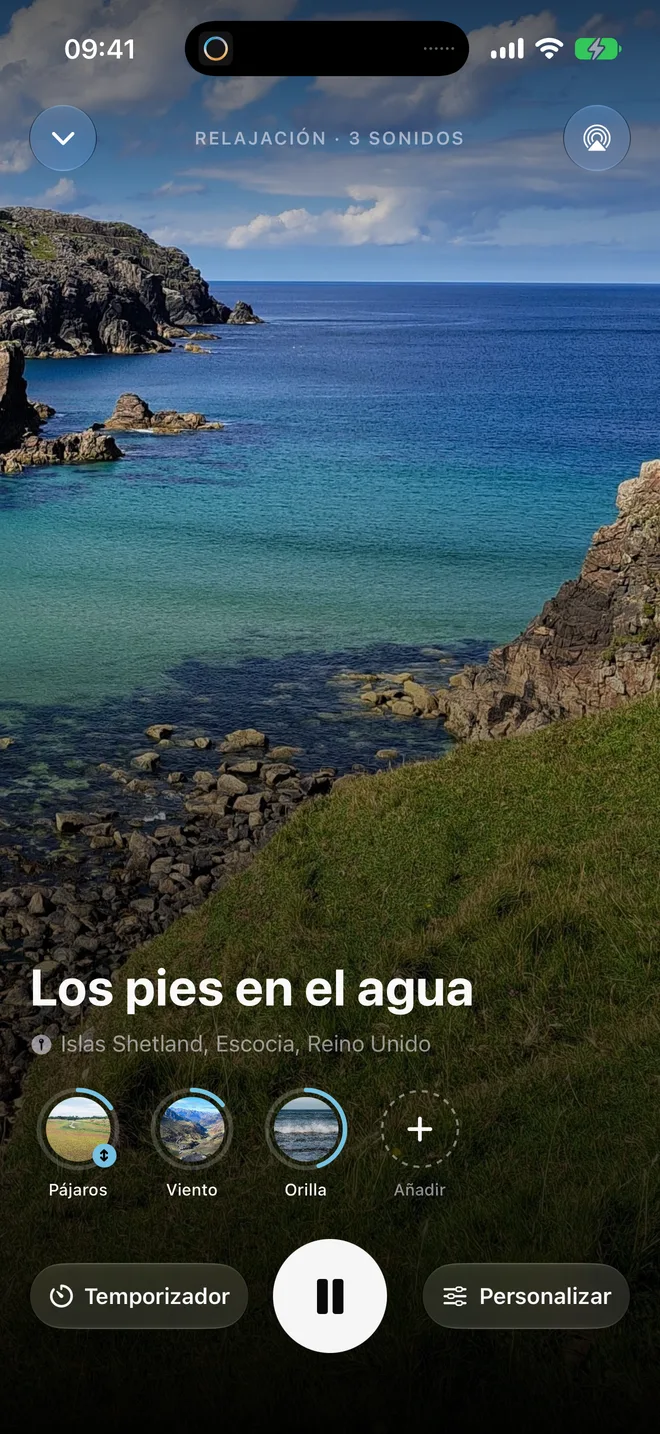 El reproductor de Oasis en iPhone: Los pies en el agua, con Pájaros, Viento y Orilla
